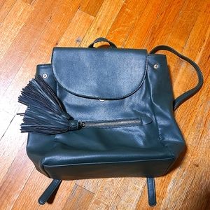 Green purse backpack